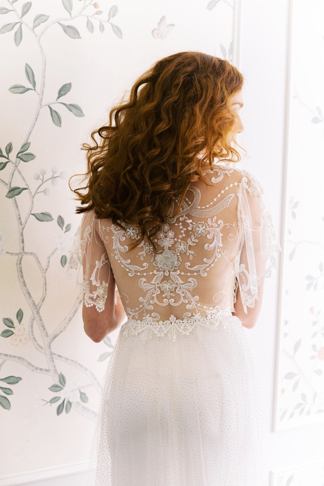 Detailed sheer back designs on dress by Claire Pettibone