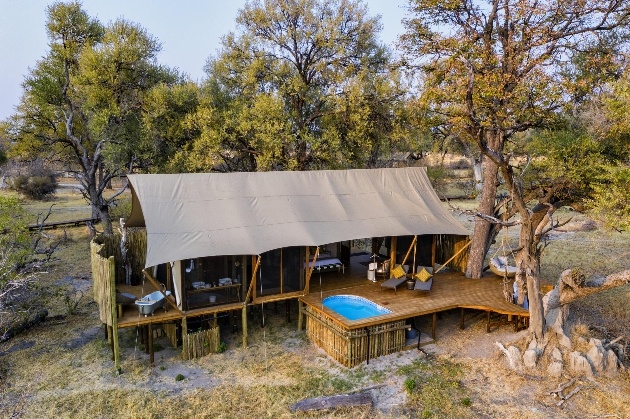 lodge camp with pool in trees