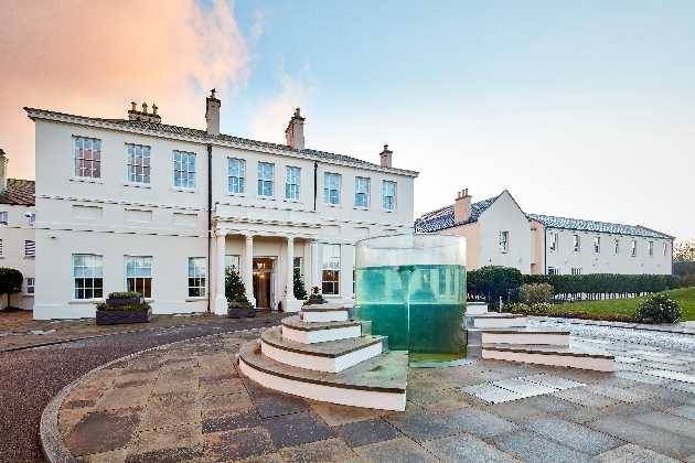 Seaham Hall white mansion with water feature in driveaway