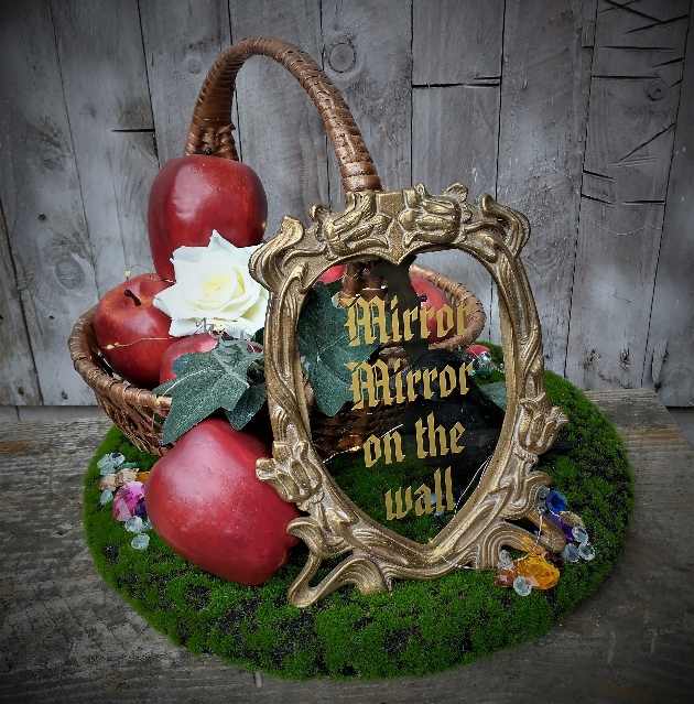 snow white themed basket with apples