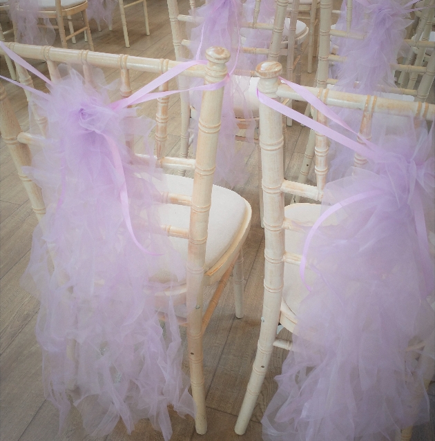 chivari chairs with pink frill backs