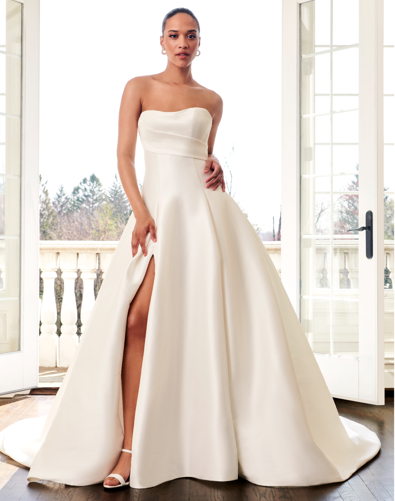 model in strapless a line dress duchess satin with thigh split 